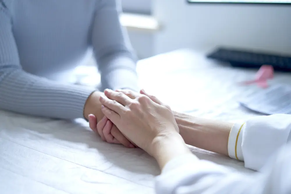 Patient getting support from doctor