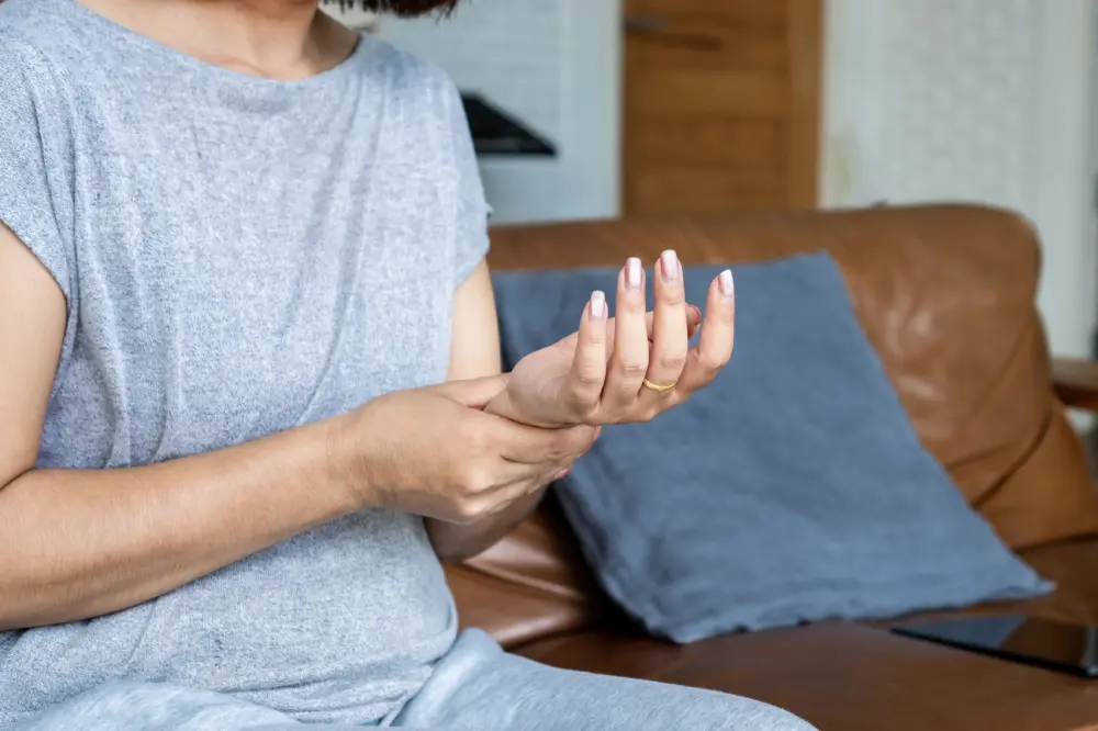 Woman experiencing wrist pain